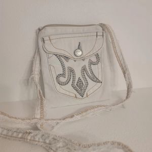 Handmade crossbody purse from upcycled miss me jeans